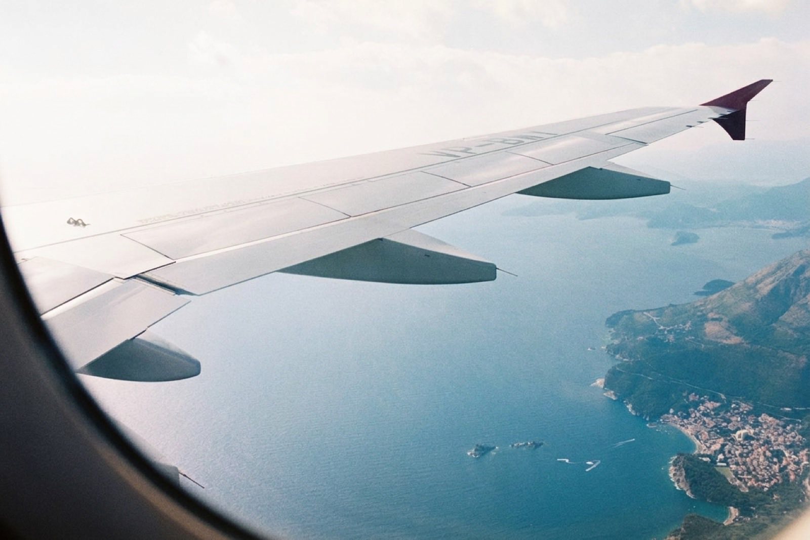 View from an airplane window over the Adriatic coastline
